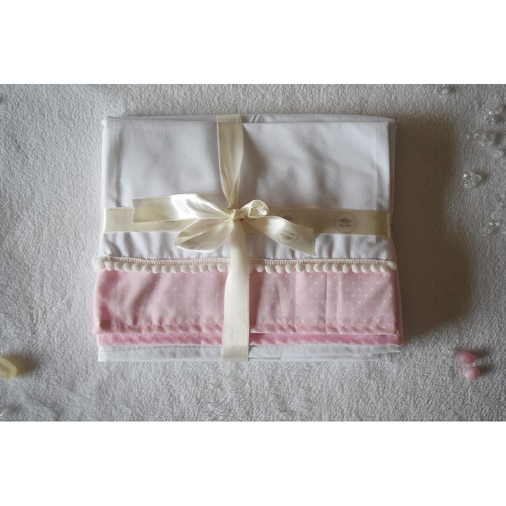 Sabanas de cuna funcional rosa con lunares blancos